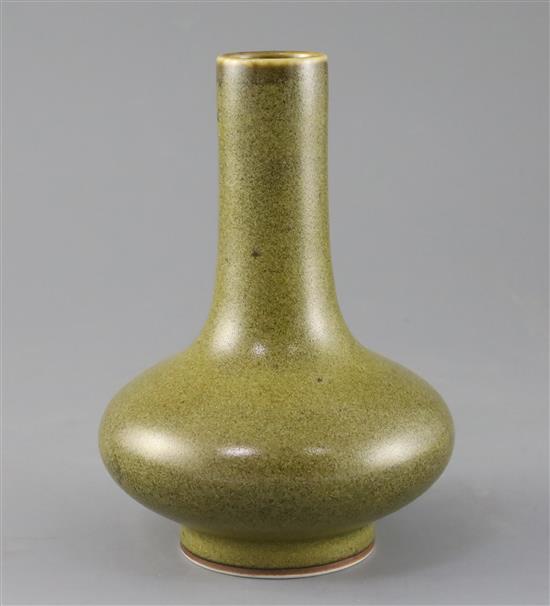 A Chinese teadust glazed bottle vase, H.17cm